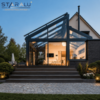 Véranda en aluminium à haute efficacité énergétique avec verre isolant, structure moderne et vue panoramique pour maisons contemporaines et espaces de jardin