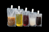 Vente en gros de boisson jetable en plastique sac d'emballage debout transparent liquide avec bec pour lait boisson thé jus eau