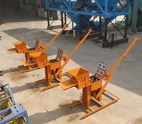 Machine manuelle populaire et écologique pour la fabrication de briques en terre cuite emboîtables