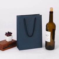 Sac en papier recyclable imprimé avec logo personnalisé emballage cadeau réutilisable sacs à provisions en papier noir
