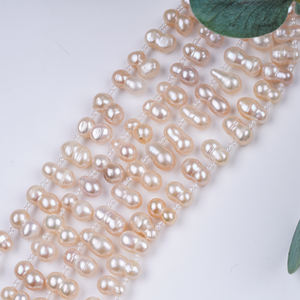 ไข่มุกธรรมชาติรูปทรงบาโรกสีชมพูขนาด7นิ้ว8-11มม. พร้อมไข่มุกน้ำจืดด้านข้าง - Product Image 4