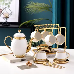 ceramic golden tea set with teapot milk pot sugar jars porcelain tea cup saucer set gold coffee cups