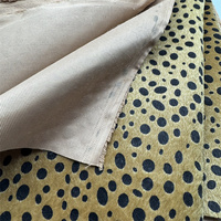Tissu en fausse fourrure de mouton à motif léopard utilisé pour le portefeuille