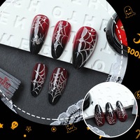 Faux ongles ovales réutilisables en ABS de haute qualité, style gothique audacieux pour Halloween, avec pointes œil-de-chat rouge-noir argentées, vente en gros