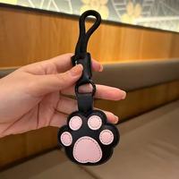 Porte-clés en cuir en forme de patte de chat de dessin animé, porte-clés de voiture en forme d'os, adorable breloque de sac à dos, cadeau en gros