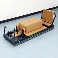 Reformer Pilates pliable pour la maison, avec structure en aluminium et design coulissant, idéal pour le fitness et l'entraînement du tronc