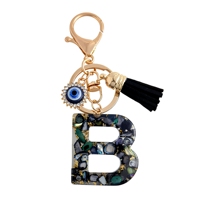 Porte-clés en résine Alphabet avec œil turc bleu, strass et pompon, breloque de sac à main, porte-clés personnalisé avec initiale, bijou fantaisie, cadeau
