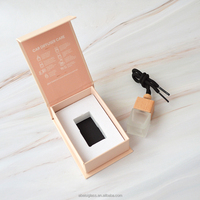Boîte-cadeau magnétique pliable personnalisée de luxe en papier, boîte d'emballage de bouteille de parfum de voiture