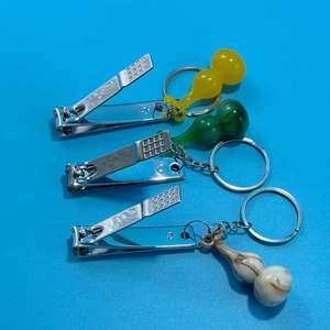Cortauñas con forma de calabaza, accesorio portátil para cortar uñas con llavero, precio al por mayor de 2 yuanes. - Product Image 1