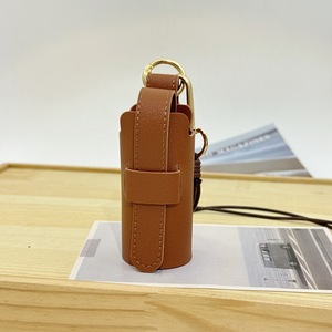 Porte-clés en PVC en forme de rouge à lèvres, pendentif populaire, ensemble d'accessoires pour sacs à main pour femmes, mini sac de rangement haut de gamme, étanche, avec sangle réglable - Product Image 5