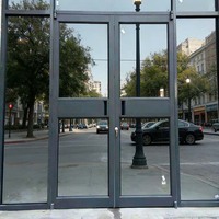 Porte d'entrée de sécurité en alliage d'aluminium à double vitrage pour supermarché, hôtel, banque et entrée de magasin - Conception étanche