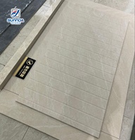 Carrelage en porcelaine Guanyi moderne 1000x1000mm 10mm, aspect brique murale mate, pour l'intérieur des chambres d'hôtel, garantie 1 an
