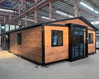 Maison modulaire préfabriquée pliable de 20 pieds ou 40 pieds avec toit en pente, structure en acier portable, maison conteneur extensible pour habitation