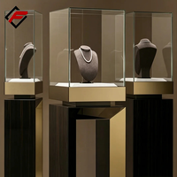 Vitrine à bijoux sur mesure en métal imitation bois, avec vitrine incurvée en verre trempé, comptoir de boutique verrouillable avec éclairage LED