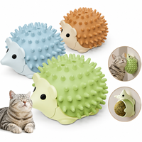 Jouet interactif pour chat en forme d'ormeau avec herbe à chat, en ABS et TPR, pour léchage et toilettage rotatif mural