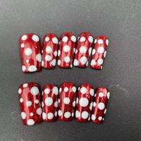 Ongles artificiels rectangulaires faits main de haute qualité, effet œil de chat rouge et cercle blanc, réutilisables, vente en gros pour usines
