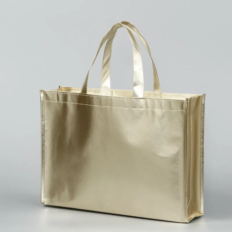 Bolso no tejido Laminado metálico con láser impermeable superventas, bolso de mano no tejido PP dorado brillante de color brillante