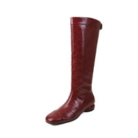 Bottes longues matelassées à motif losanges, bout rond et talon carré bas
