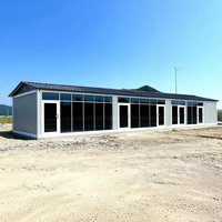 Maison préfabriquée modulaire de luxe, petite et détachable, en conteneur, avec panneaux sandwich, pour hôtel et immeuble de bureaux