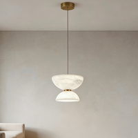 Lustre moderne de luxe en marbre, luminaire suspendu au plafond en acier au design tendance pour l'éclairage intérieur de la maison