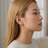 Anting-anting tusuk tulang rawan titanium ASTM F136 dengan zircon bentuk kepingan salju Maina Bow, ulir dalam, model Trguas.
