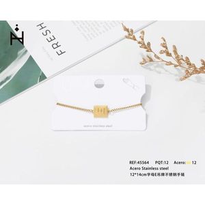 Bracciale con catena placcata in oro Angelina, lettera E, gioielli di moda unisex, 12x14 cm - Product Image 1