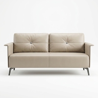 Sofa Kantor Kulit Beige Elegan Kaki Logam Hitam Sofa Minimalis Modern untuk Ruang Santai Eksekutif