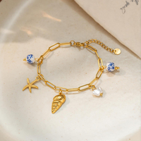 Bracelet en acier inoxydable avec breloques étoile de mer et coquillage, perles en céramique florales bleues, plaqué or 18K PVD, étanche, bijoux d'été