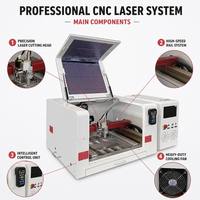 Mini machine de découpe laser à fibre 800W 1200W 4040 refroidie par air pour la découpe de bijoux en acier inoxydable et de métaux
