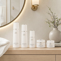 Ensemble d'emballages cosmétiques de luxe en verre dépoli blanc avec garniture dorée, cylindres de 30g/50g, 40ml/100ml/120ml, vente en gros