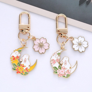 Llavero Metálico Kawaii <span class=keywords><strong>de</strong></span> Conejo Rosa con Sakura y Luna para Mujer, Colgante Lindo <span class=keywords><strong>de</strong></span> Conejito para Bolso, Regalo <span class=keywords><strong>de</strong></span> Primavera con Flor <span class=keywords><strong>de</strong></span> Cerezo para Ella - Product Image 2