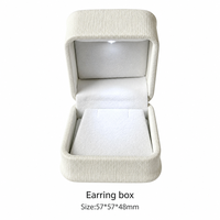 Boîte à bijoux élégante avec éclairage LED, insert en velours, pour bague, boucles d'oreilles, collier, bracelet, montre, logo personnalisé, OEM, vente en gros