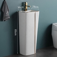Ensemble WC monobloc moderne en céramique avec lavabo sur colonne pour appartement