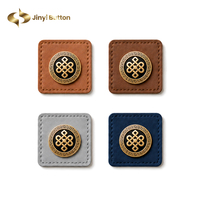 Étiquette en cuir personnalisée Jinyi pour accessoires hijab et abaya, avec logo brodé carré et logo métallique, fabrication OEM/ODM