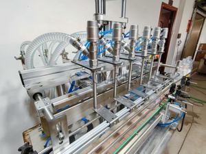 Macchina per il riempimento di liquidi a sei teste indispensabile: veloce, regolabile. Risolvere i problemi di riempimento nel cibo, nelle bevande. Aggiornamento oggi - Product Image 5