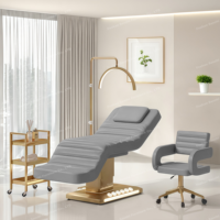 Lit de massage de luxe avec base dorée, commande au pied, 3 moteurs et lumière LED pour salon de beauté