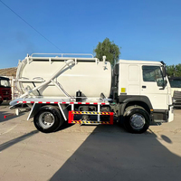 Camion d'aspiration des eaux usées Sinotruk 4x2 10CBM avec pompe à vide et réservoir de 10000L, occasion