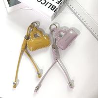Nouvelle mode : Décoration suspendue pour petit sac, faite main, en cuir et coton, avec corde tressée exquise en PU, porte-clés portable