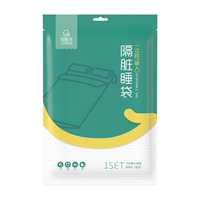 Ensemble de literie jetable portable non tissé en quatre pièces de haute qualité, doux et confortable, conception simple en gros pour hôtel de voyage