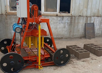Machine de fabrication de blocs creux en béton QTF40-3B mobile manuelle à petite échelle, faible investissement, haute rentabilité, pour le bâtiment - Chine