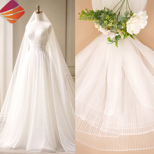 <span class=keywords><strong>Tissu</strong></span> en tulle <span class=keywords><strong>plissé</strong></span> léger et personnalisable 100 % polyester tricoté beige et <span class=keywords><strong>blanc</strong></span> pour robe de mariée et voile de mariée - Product Image 1