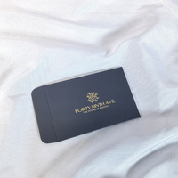 Enveloppe de livraison Enveloppe en carton noir mat avec logo en feuille d'or Enveloppe en papier personnalisée pour marque de mode