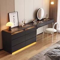 Bureau de toilette moderne noir avec plateau en verre, éclairage LED intégré, plusieurs tiroirs et armoire latérale pour chambre à coucher