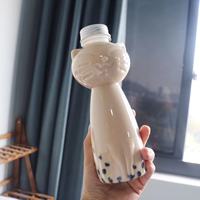 Bouteille de boisson en forme de chat en plastique jetable PET de 500ML nouveau type avec bouchon à vis en aluminium pour jus Soda café thé