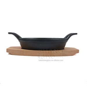 Vente de gros <span class=keywords><strong>Plat</strong></span> à <span class=keywords><strong>gratin</strong></span> rond en fonte Assiette Fajita avec socle en bois - Product Image 5