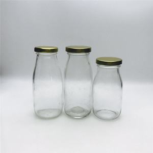 Nhà Máy Trực Tiếp Cổ Điển 200Ml 250Ml 500Ml <span class=keywords><strong>1</strong></span> Lít Chai Thủy Tinh Rỗng Với Nắp Kim Loại - Product Image 2