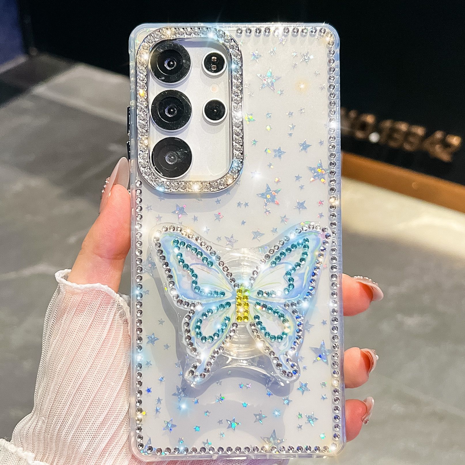 Supporto a farfalla con diamante trasparente a forma di stella