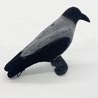 Ornements de corbeaux en plastique gris floqués pour effrayer les oiseaux