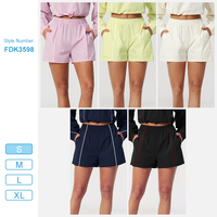 Shorts de sport décontractés pour femmes FDK3598, protection solaire, séchage rapide, bande latérale contrastée, taille élastique, avec poches, pour activités de plein air