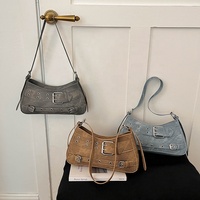 Sac à bandoulière élégant et polyvalent en PU style motard vintage, design de niche en polyester, tendance printemps